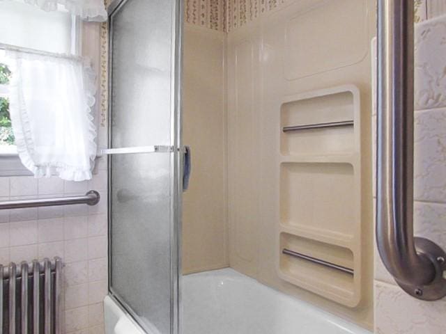 21 Hemlock Ave, Cranston, RI 02910 - bathroom with radiator heating unit and shower / bath combination with glass door