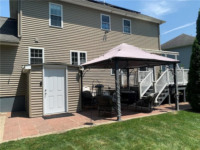 50 Paliotta Pkwy, Cranston, RI 02921 - rear view of property with a gazebo, a patio, and a lawn