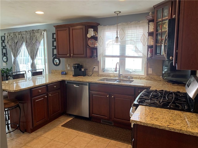 50 Paliotta Pkwy, Cranston, RI 02921 - kitchen with appliances with stainless steel finishes, a peninsula, healthy amount of natural light, open shelves, and recessed lighting