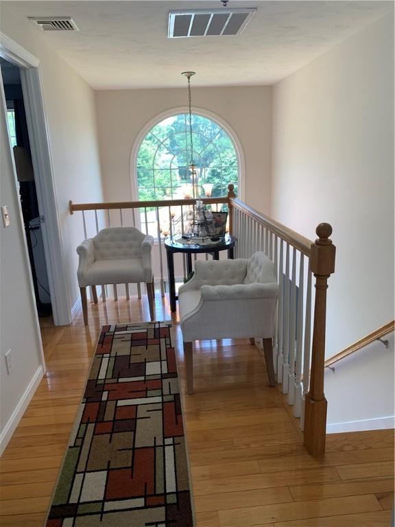 50 Paliotta Pkwy, Cranston, RI 02921 - stairs featuring wood finished floors and baseboards