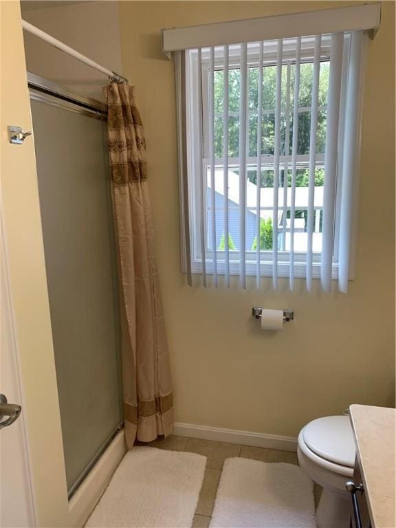 50 Paliotta Pkwy, Cranston, RI 02921 - bathroom featuring a shower stall, tile patterned flooring, and vanity