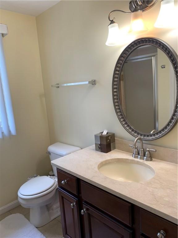 50 Paliotta Pkwy, Cranston, RI 02921 - bathroom featuring vanity and tile patterned floors