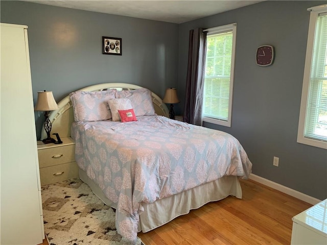 50 Paliotta Pkwy, Cranston, RI 02921 - bedroom with wood finished floors and multiple windows