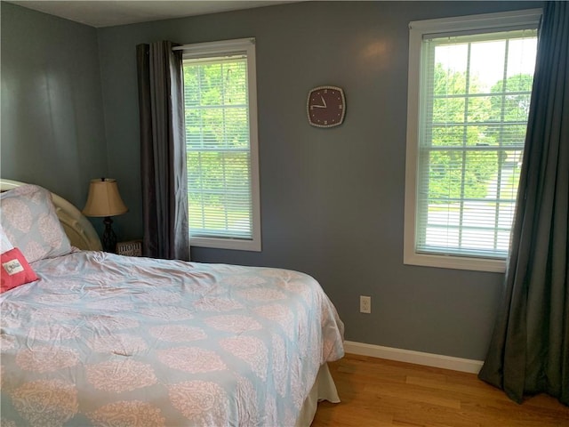 50 Paliotta Pkwy, Cranston, RI 02921 - bedroom with wood finished floors and multiple windows