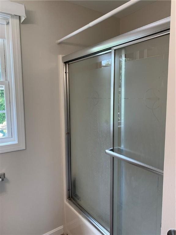 50 Paliotta Pkwy, Cranston, RI 02921 - bathroom with enclosed tub / shower combo and baseboards