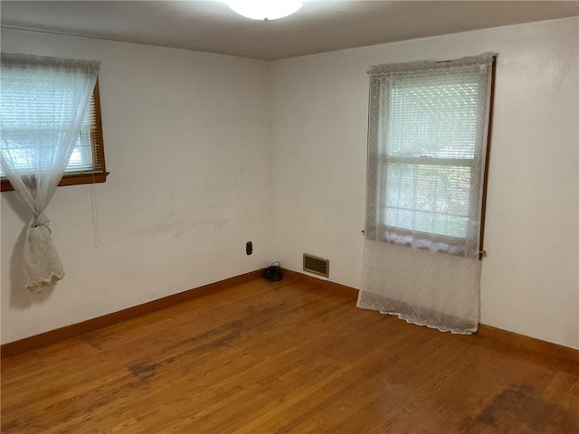 19 Leawood Dr, Cranston, RI 02920 - spare room with wood finished floors and healthy amount of natural light