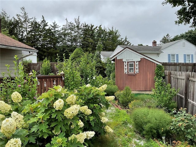 19 Leawood Dr, Cranston, RI 02920 - fenced backyard with a storage unit