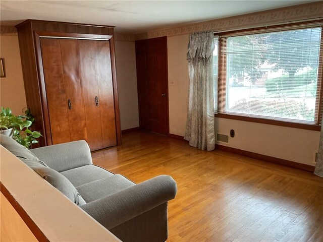 19 Leawood Dr, Cranston, RI 02920 - living area featuring light wood-style flooring and baseboards