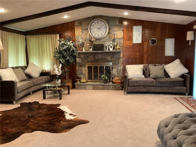 19 Leawood Dr, Cranston, RI 02920 - carpeted living room with wooden walls and a stone fireplace