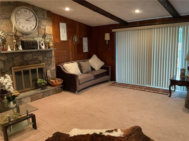 19 Leawood Dr, Cranston, RI 02920 - carpeted living room featuring beam ceiling, a stone fireplace, and wood walls