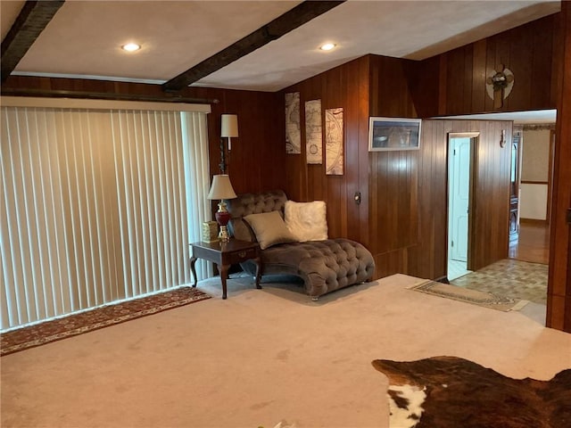 19 Leawood Dr, Cranston, RI 02920 - sitting room featuring beamed ceiling, wooden walls, and carpet floors