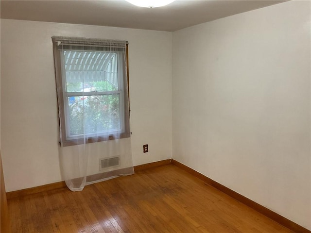 19 Leawood Dr, Cranston, RI 02920 - empty room with baseboards and light wood-style flooring