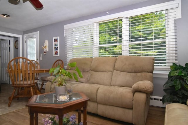 32 Harrington Dr, Johnston, RI 02919 - living area featuring ceiling fan, baseboard heating, and wood finished floors