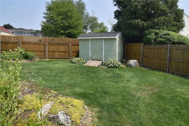 32 Harrington Dr, Johnston, RI 02919 - fenced backyard with a storage unit