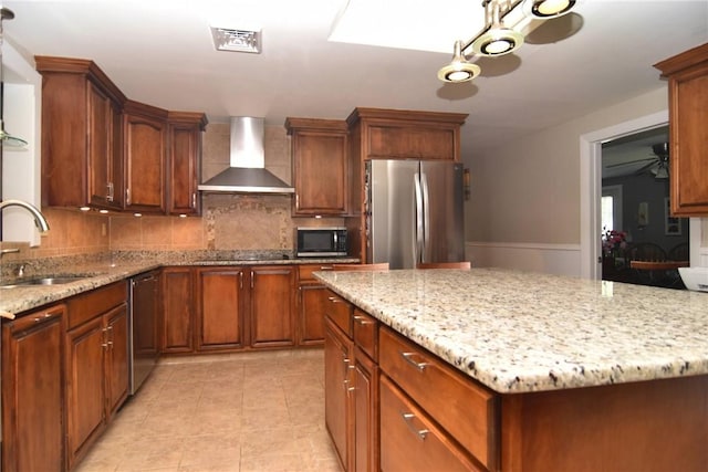 32 Harrington Dr, Johnston, RI 02919 - kitchen featuring stainless steel appliances, wall chimney range hood, backsplash, and light stone countertops