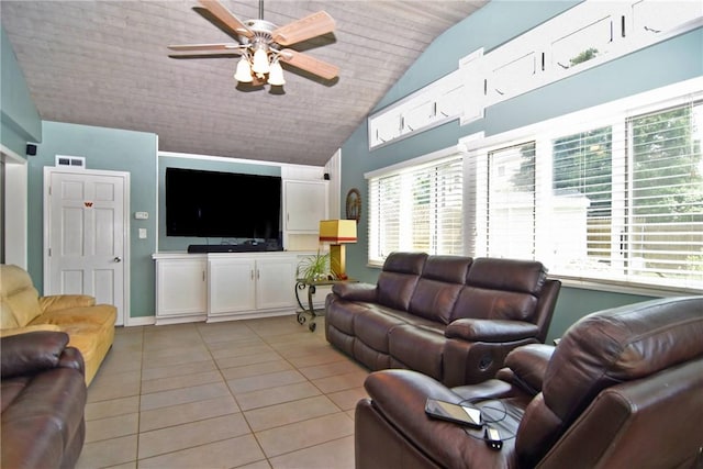 32 Harrington Dr, Johnston, RI 02919 - living area with light tile patterned flooring, vaulted ceiling, a ceiling fan, and plenty of natural light
