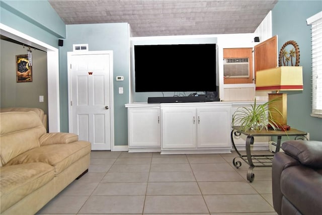 32 Harrington Dr, Johnston, RI 02919 - living room with light tile patterned floors and an AC wall unit