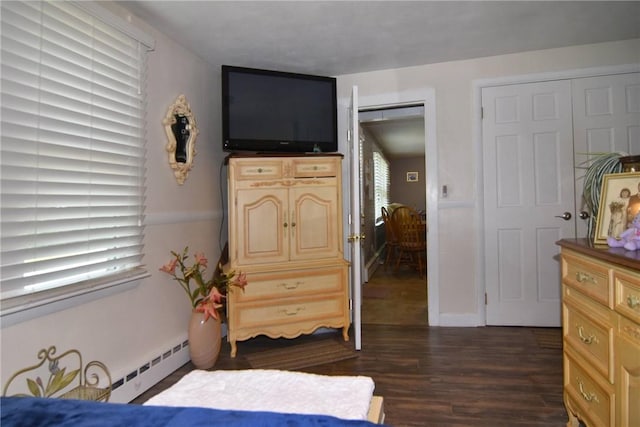 32 Harrington Dr, Johnston, RI 02919 - bedroom featuring dark wood-style flooring, multiple windows, and a baseboard radiator