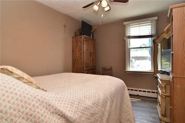 32 Harrington Dr, Johnston, RI 02919 - bedroom with baseboard heating, dark wood-type flooring, and ceiling fan