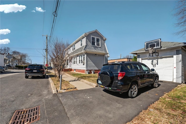 1264 Elmwood Ave, Providence, RI 02907 - view of front of house with a garage
