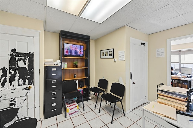 1264 Elmwood Ave, Providence, RI 02907 - home office with a paneled ceiling and light tile patterned flooring