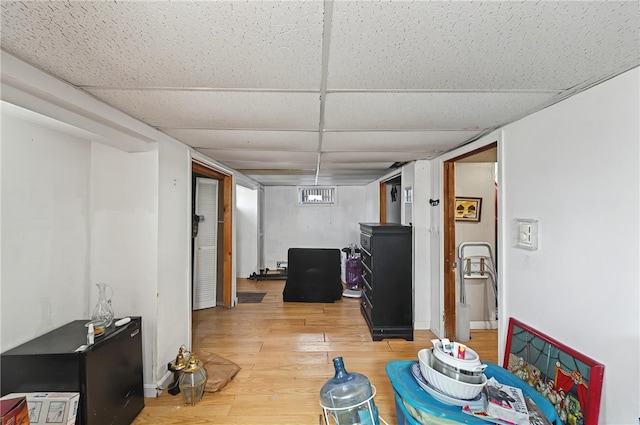 1264 Elmwood Ave, Providence, RI 02907 - finished below grade area featuring a paneled ceiling and light wood-type flooring