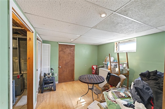 1264 Elmwood Ave, Providence, RI 02907 - below grade area featuring wood finished floors and a paneled ceiling