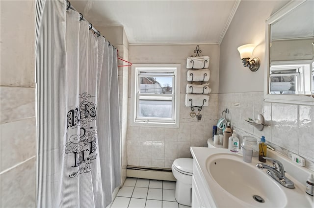 1264 Elmwood Ave, Providence, RI 02907 - full bathroom featuring crown molding, tile patterned flooring, tile walls, baseboard heating, and vanity