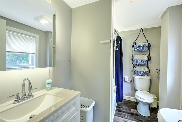 571 Spring St, Newport, RI 02840 - bathroom featuring wood finished floors and vanity