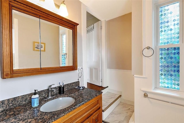 571 Spring St, Newport, RI 02840 - bathroom with marble finish flooring and vanity