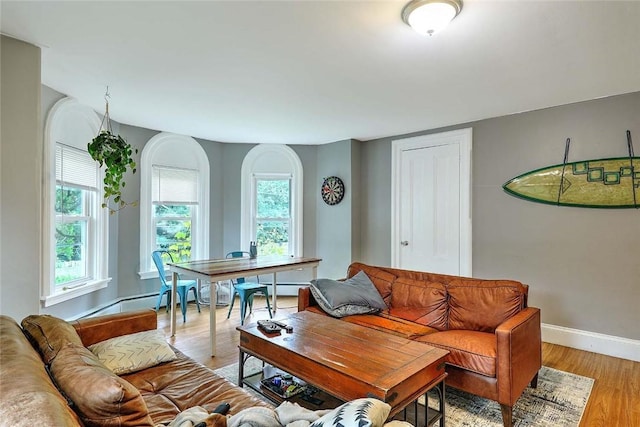 571 Spring St, Newport, RI 02840 - living area featuring baseboards and light wood-style flooring