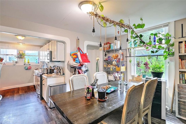 571 Spring St, Newport, RI 02840 - dining room with dark wood finished floors and baseboards