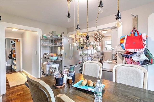 571 Spring St, Newport, RI 02840 - dining room featuring arched walkways and wood finished floors