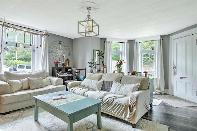 571 Spring St, Newport, RI 02840 - living area with wood finished floors and a chandelier