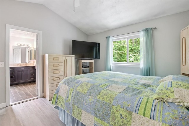 9 Ivy Hollow Ct, Cranston, RI 02921 - bedroom featuring lofted ceiling, light wood finished floors, ensuite bathroom, and a ceiling fan