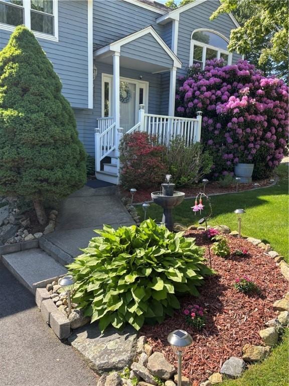9 Ivy Hollow Ct, Cranston, RI 02921 - property entrance with a porch