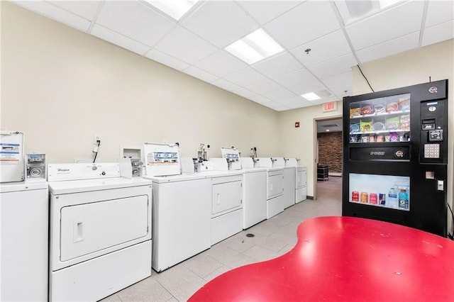 65 Weybosset St Unit 222, Providence, RI 02903 - shared laundry with washing machine and clothes dryer and light tile patterned floors