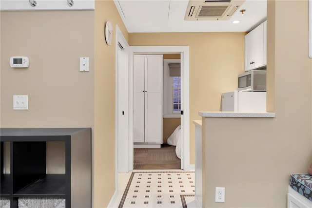 65 Weybosset St Unit 222, Providence, RI 02903 - hallway featuring cooling unit and recessed lighting