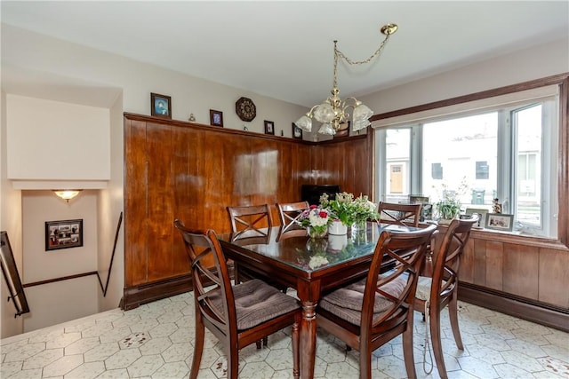 8 Sturbridge Ave, Smithfield, RI 02828 - dining space with a chandelier and a baseboard radiator