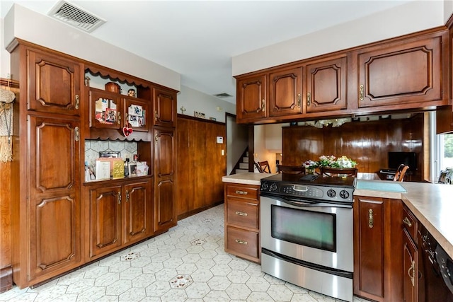 8 Sturbridge Ave, Smithfield, RI 02828 - kitchen with stainless steel electric stove, light countertops, light floors, and brown cabinets