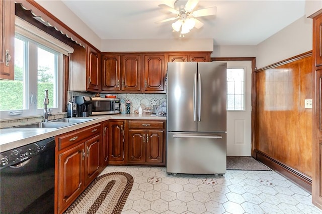 8 Sturbridge Ave, Smithfield, RI 02828 - kitchen featuring appliances with stainless steel finishes, light countertops, ceiling fan, and backsplash