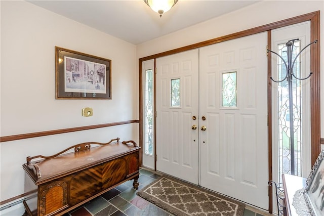 8 Sturbridge Ave, Smithfield, RI 02828 - foyer with healthy amount of natural light and a baseboard radiator