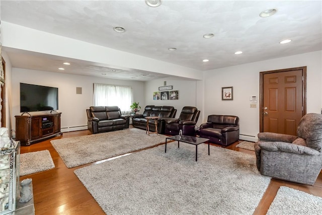 8 Sturbridge Ave, Smithfield, RI 02828 - living area featuring wood finished floors, recessed lighting, a baseboard radiator, and a baseboard heating unit