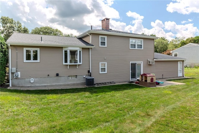 8 Sturbridge Ave, Smithfield, RI 02828 - back of property featuring a lawn, a chimney, roof with shingles, and a patio area