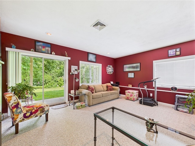 200 Cannon St Unit 130, Cranston, RI 02920 - carpeted living area with healthy amount of natural light and recessed lighting