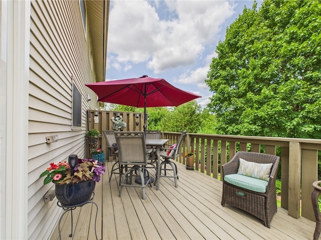 200 Cannon St Unit 130, Cranston, RI 02920 - wooden terrace with outdoor dining area