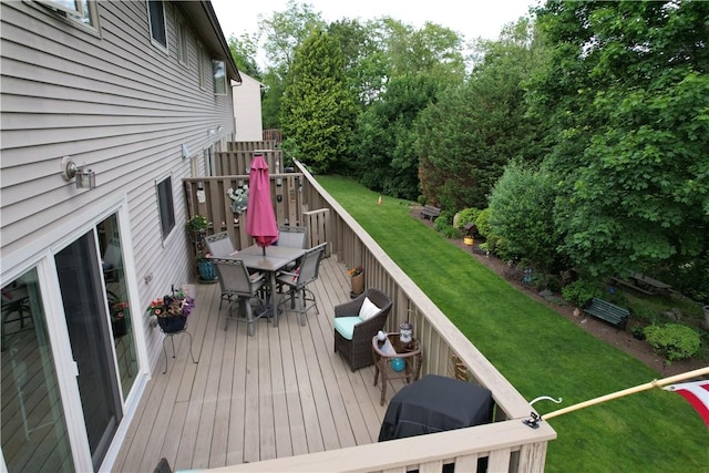 200 Cannon St Unit 130, Cranston, RI 02920 - deck with outdoor dining space, a grill, and a lawn