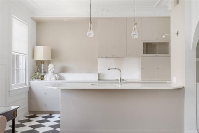 157 Waterman St Unit 2-5, Providence, RI 02906 - kitchen with tile patterned floors, light countertops, and decorative light fixtures