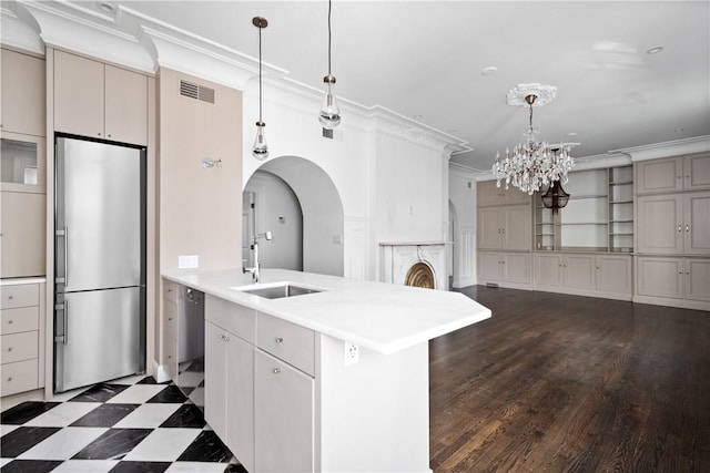 157 Waterman St Unit 2-5, Providence, RI 02906 - kitchen with stainless steel appliances, ornamental molding, light countertops, arched walkways, and a chandelier