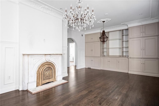 157 Waterman St Unit 2-5, Providence, RI 02906 - unfurnished living room featuring arched walkways, ornamental molding, a chandelier, and dark wood-type flooring
